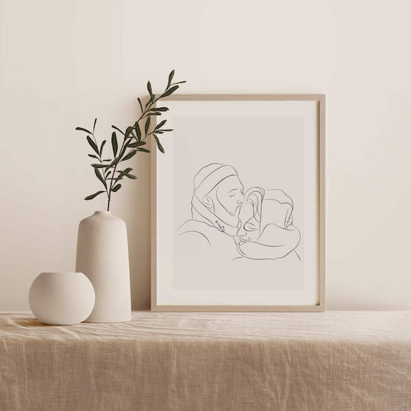 Line Art -piirros pariskunnasta, piirros kehyksessä pöydällä kasvin vieressä